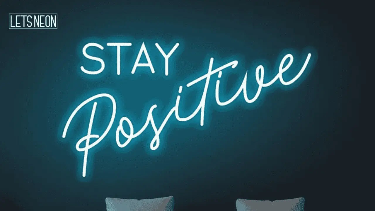 neon sign image written STAY POSITIVE for the blog post How To Hang A Neon Sign – Let’s Neon User Manual