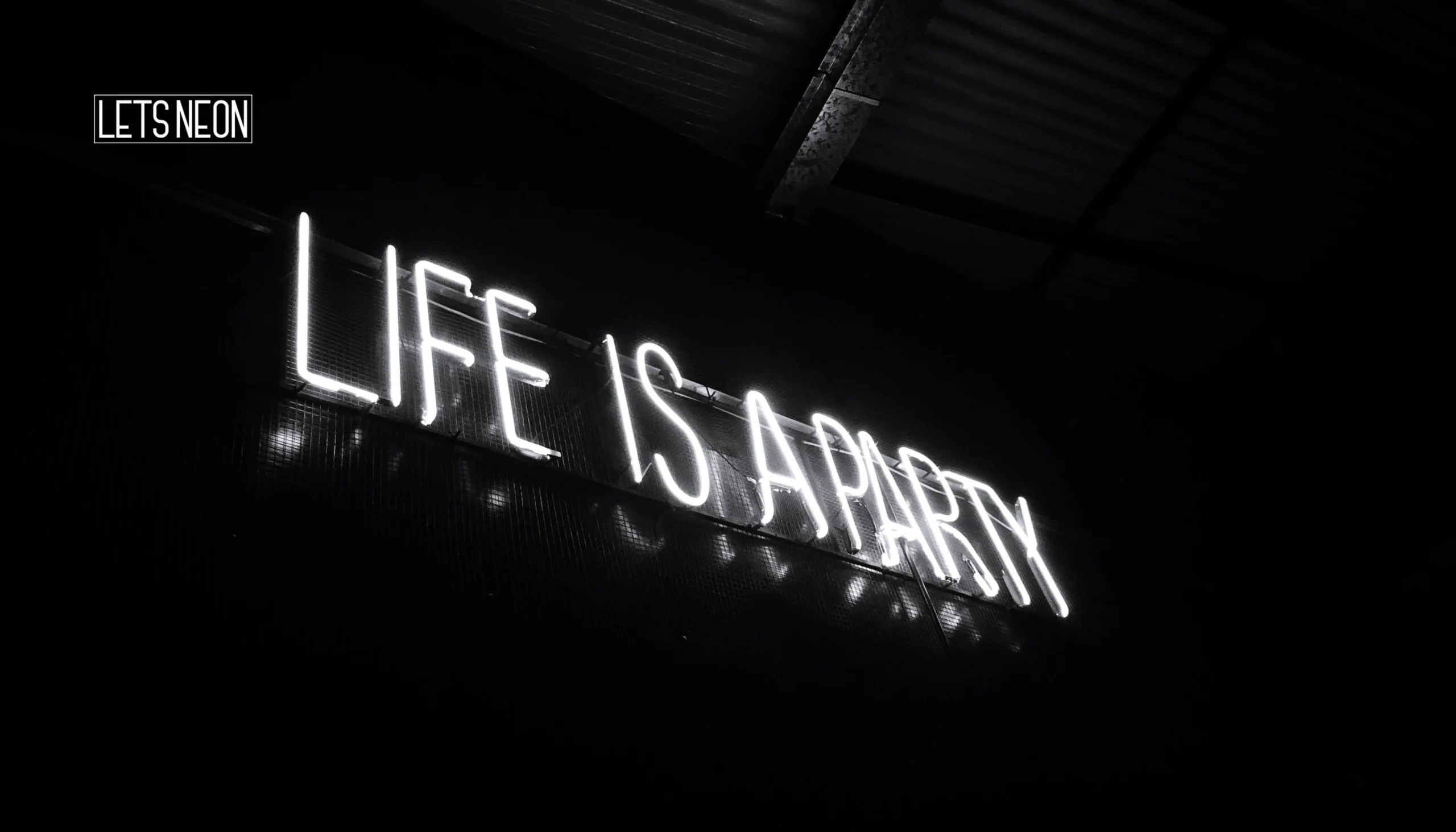 Neon sign custom glowing at night.